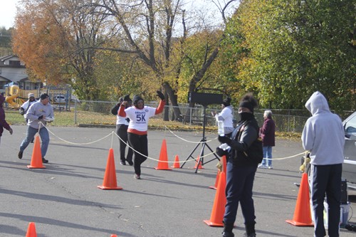 5K participants running to the finish line