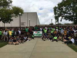 Farrell School District students and staff wore green and donated to support an injured Laurel High School student athlete