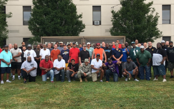 Male Role models gather to welcome students back to school