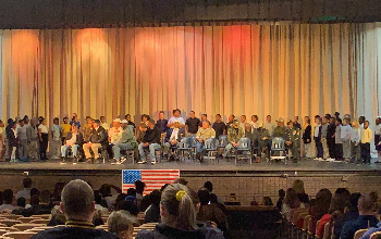 Third grade students sing to community veterans during the ninth annual Veterans Day program