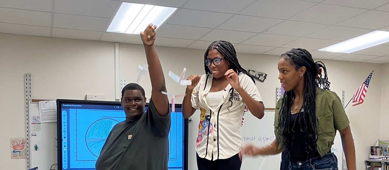 Student perform science experiments